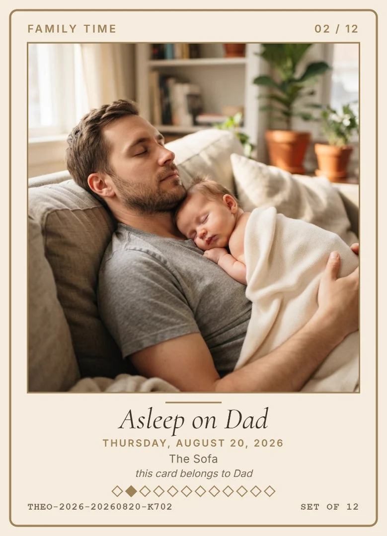 A tired father asleep on the sofa with his newborn sleeping on his chest under a cream blanket, on a cream keepsake card