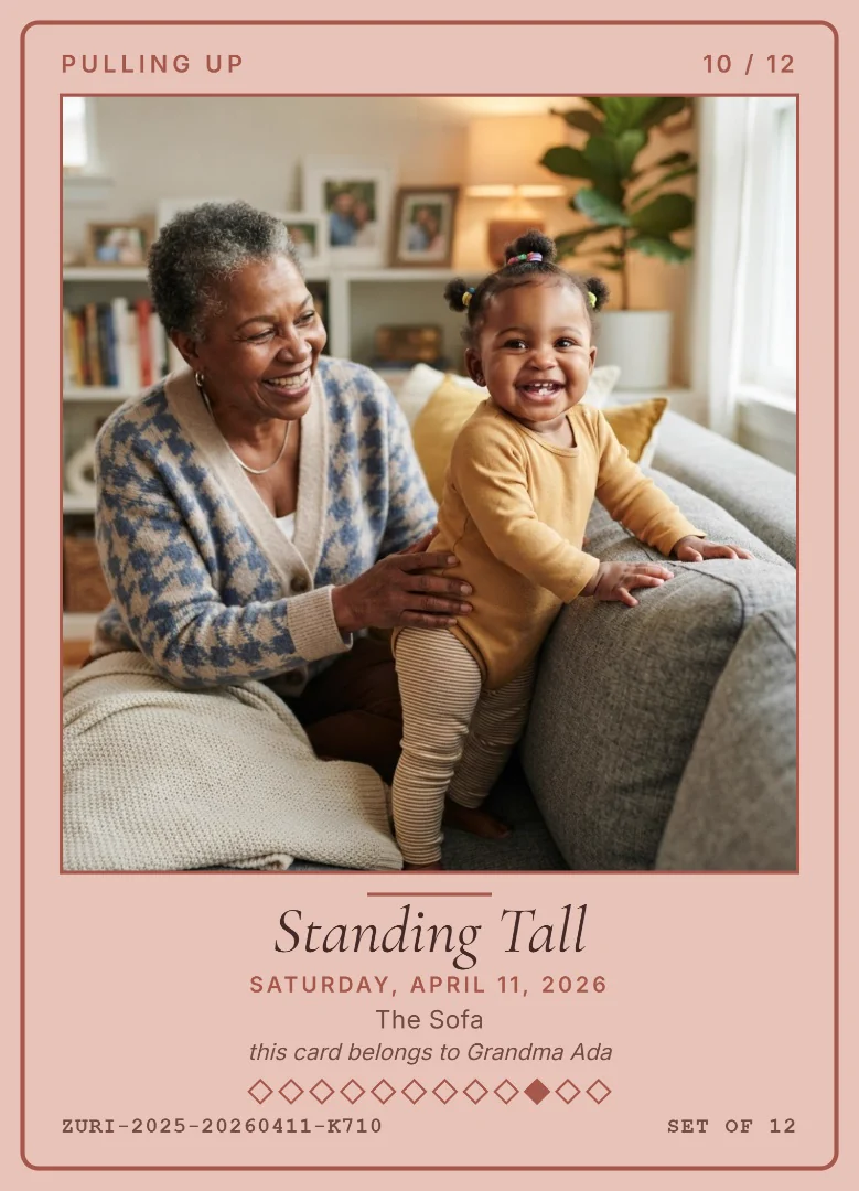 A ten-month-old baby girl pulling herself up on a sofa while her grandmother smiles beside her, on a rose gold keepsake card